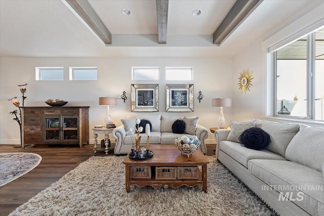 living area featuring beamed ceiling, recessed lighting, wood finished floors, and baseboards