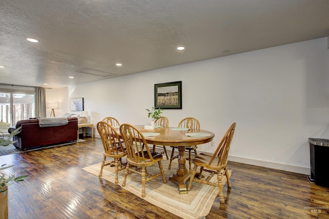 8561 W Goddard, Boise, ID 83704 - dining area with baseboards, a textured ceiling, recessed lighting, and dark wood finished floors