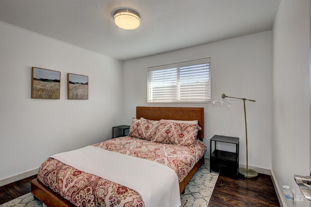 8561 W Goddard, Boise, ID 83704 - bedroom featuring baseboards and wood finished floors