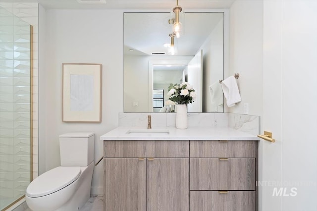 4184 E Haystack St Unit 206, Boise, ID 83716 - full bathroom with vanity, toilet, and tiled shower