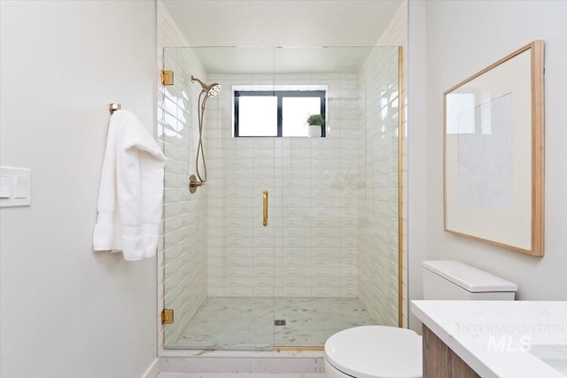 4184 E Haystack St Unit 206, Boise, ID 83716 - bathroom with vanity, toilet, and a shower stall