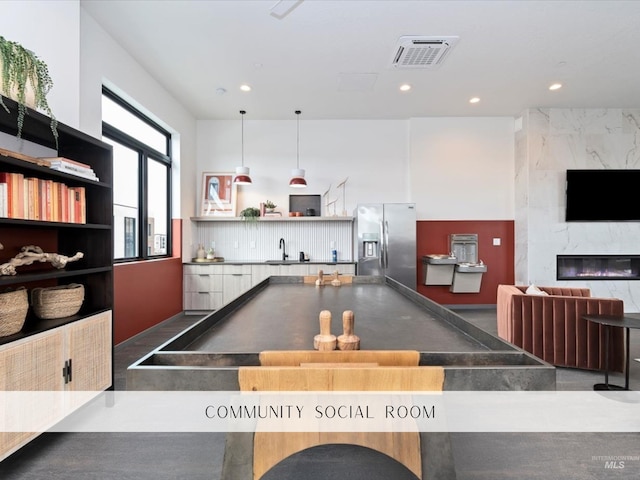 4184 E Haystack St Unit 206, Boise, ID 83716 - playroom with a high end fireplace, recessed lighting, and a sink