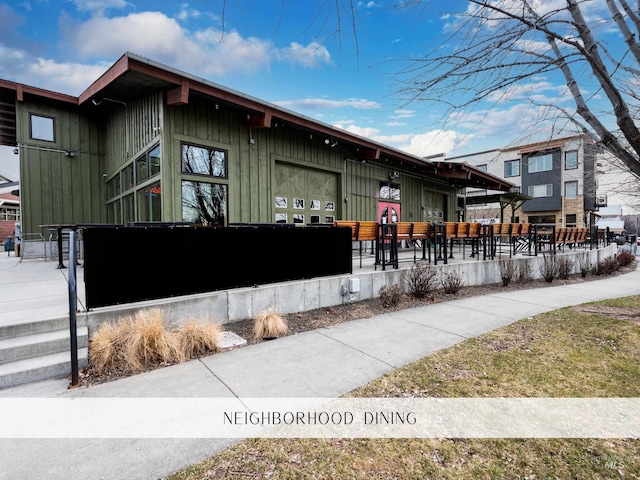 4184 E Haystack St Unit 206, Boise, ID 83716 - view of property exterior with board and batten siding and a fenced front yard