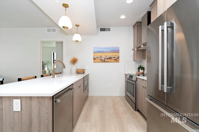 4184 E Haystack St Unit 206, Boise, ID 83716 - kitchen with stainless steel appliances, a peninsula, a sink, and modern cabinets