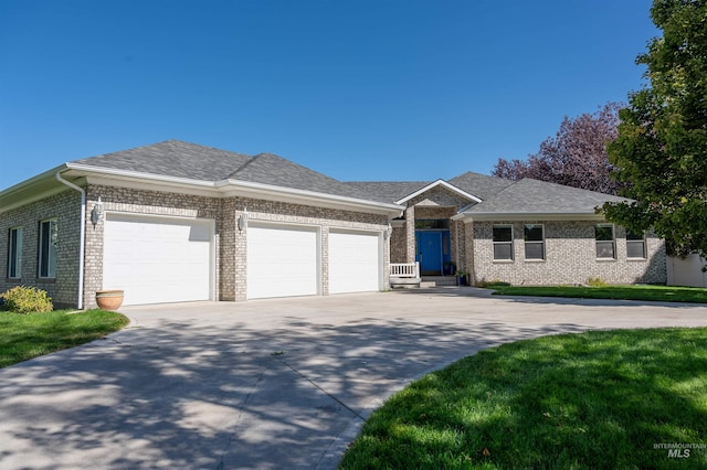 single story home with a garage