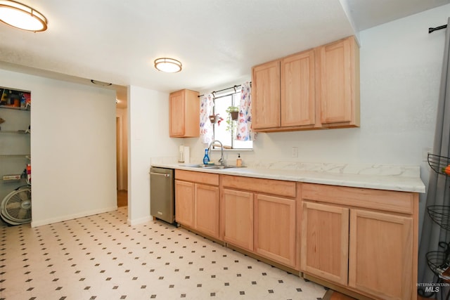1765 W 6th St, Weiser, ID 83672 - kitchen with stainless steel dishwasher, light brown cabinetry, light floors, and a sink