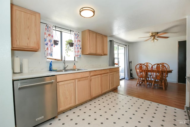 1765 W 6th St, Weiser, ID 83672 - kitchen featuring dishwasher, a sink, light brown cabinets, and light countertops