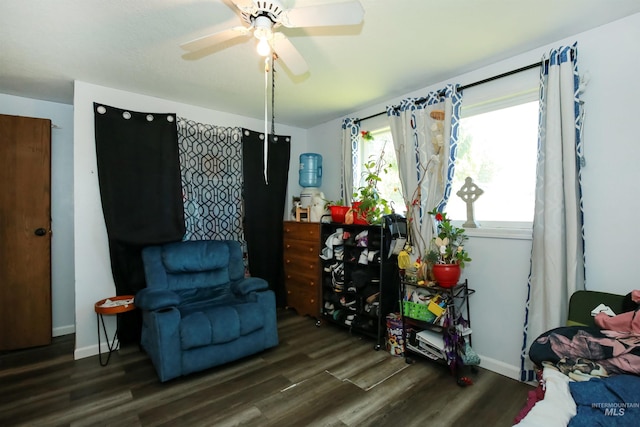 1765 W 6th St, Weiser, ID 83672 - living area with wood finished floors, a ceiling fan, and baseboards
