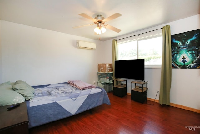1765 W 6th St, Weiser, ID 83672 - bedroom with an AC wall unit, wood finished floors, baseboards, and a ceiling fan