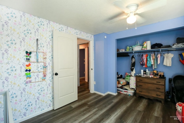 1765 W 6th St, Weiser, ID 83672 - bedroom featuring dark wood finished floors, baseboards, a closet, and a ceiling fan