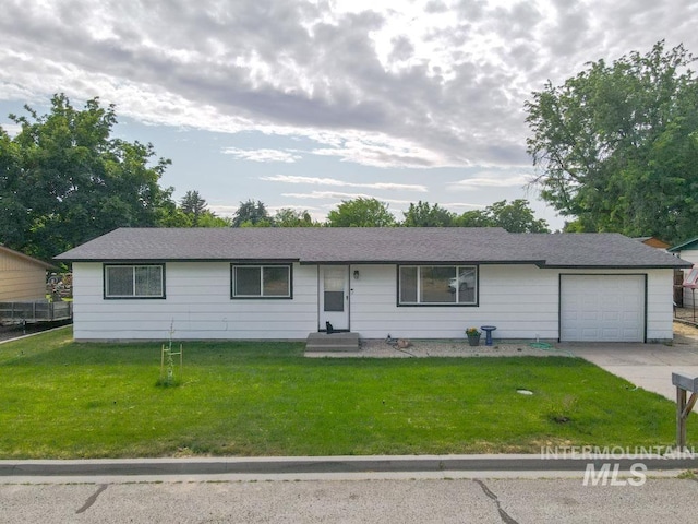 1765 W 6th St, Weiser, ID 83672 - ranch-style home featuring a garage, a front lawn, and driveway