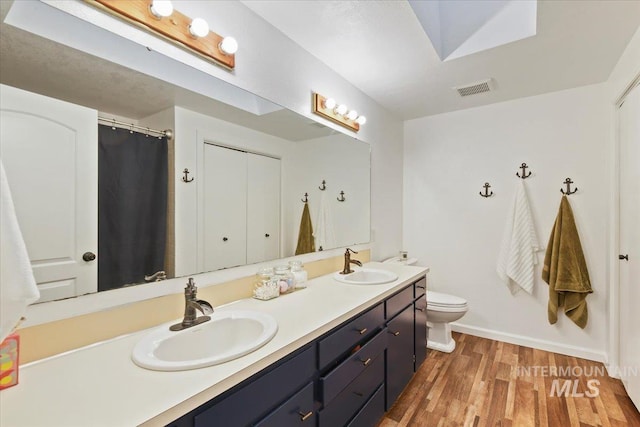 3118 Fircrest Ave, Caldwell, ID 83605 - full bathroom with double vanity, wood finished floors, and curtained shower