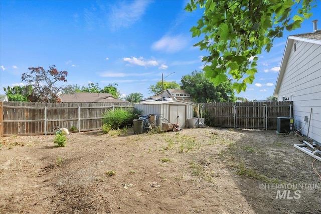 3118 Fircrest Ave, Caldwell, ID 83605 - fenced backyard featuring a storage unit