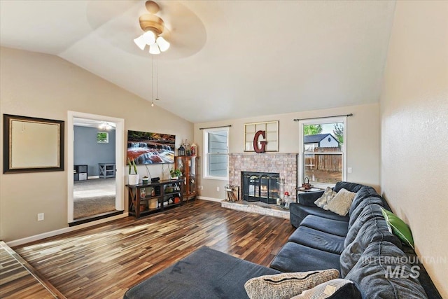 3118 Fircrest Ave, Caldwell, ID 83605 - living room with vaulted ceiling, ceiling fan, wood finished floors, and a fireplace