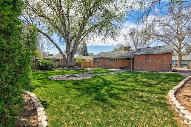 1706 Hervey, Boise, ID 83705 - view of yard with a patio, a fire pit, and a fenced backyard