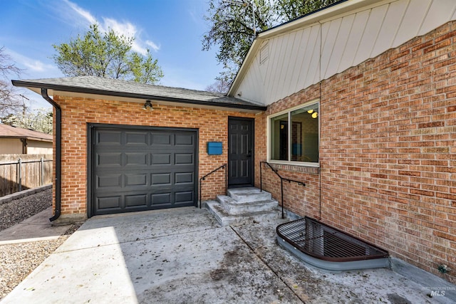 1706 Hervey, Boise, ID 83705 - exterior space featuring fence, a garage, brick siding, and driveway