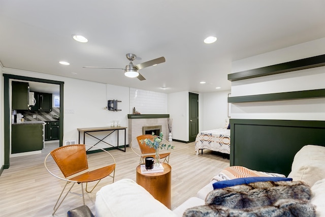 1706 Hervey, Boise, ID 83705 - living area with light wood-type flooring, recessed lighting, a fireplace, a ceiling fan, and baseboards