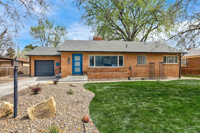 1706 Hervey, Boise, ID 83705 - ranch-style home featuring an attached garage, fence, a front yard, brick siding, and driveway