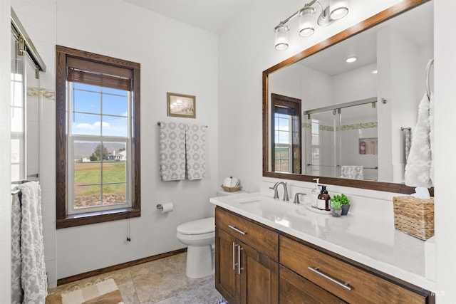 2510 Westridge Ct, Clarkston, WA 99403 - full bath featuring a shower stall, baseboards, vanity, and toilet