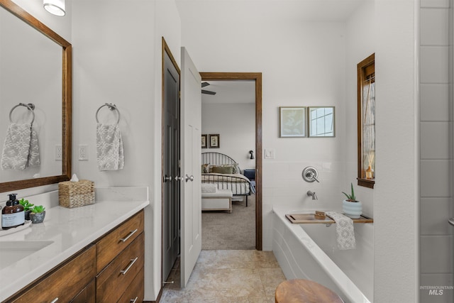 2510 Westridge Ct, Clarkston, WA 99403 - bathroom with vanity, ensuite bath, a garden tub, and tile patterned floors