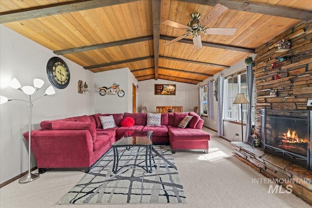 living area featuring ceiling fan, lofted ceiling with beams, carpet, baseboards, and wood ceiling