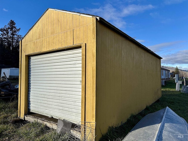 view of outbuilding featuring a garage