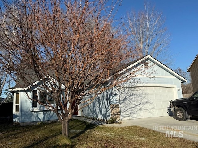 view of property exterior featuring a garage