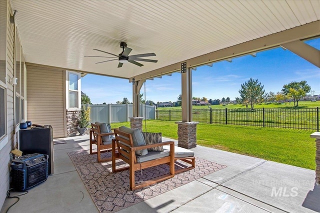 view of patio with ceiling fan