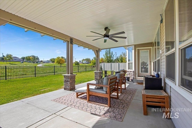 view of patio with ceiling fan