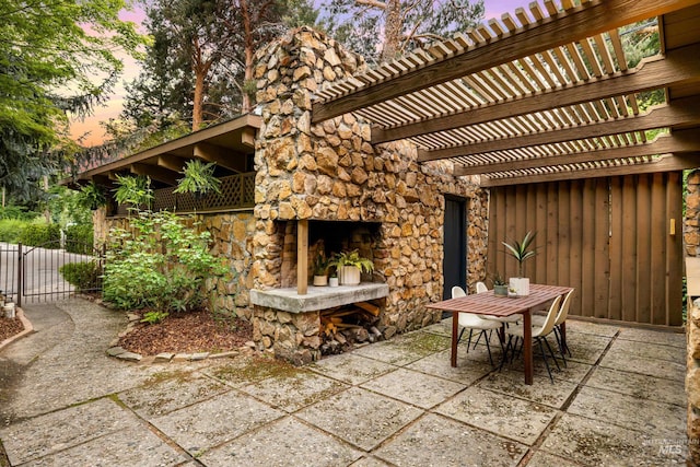 2036 N Blaine Way, Boise, ID 83702 - view of patio featuring an outdoor stone fireplace, outdoor dining space, and a pergola