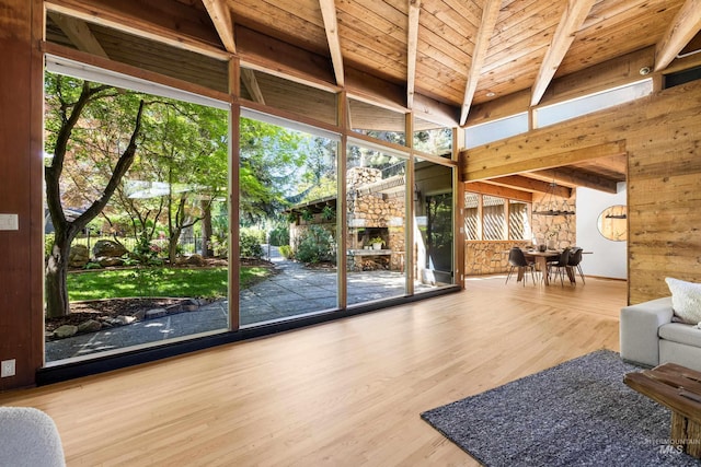 2036 N Blaine Way, Boise, ID 83702 - living room featuring wood finished floors, wooden walls, and wood ceiling