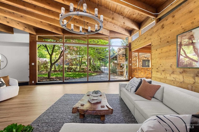 2036 N Blaine Way, Boise, ID 83702 - living area with wood ceiling, healthy amount of natural light, wood finished floors, and wooden walls