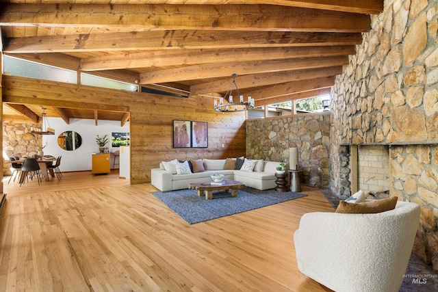 2036 N Blaine Way, Boise, ID 83702 - living room with beam ceiling, a chandelier, and wood finished floors