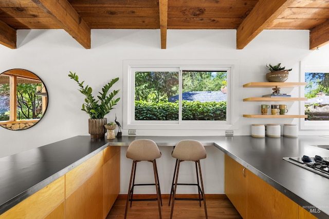 2036 N Blaine Way, Boise, ID 83702 - kitchen featuring wood ceiling with exposed beams, wood finished floors, open shelves, and stainless steel counters