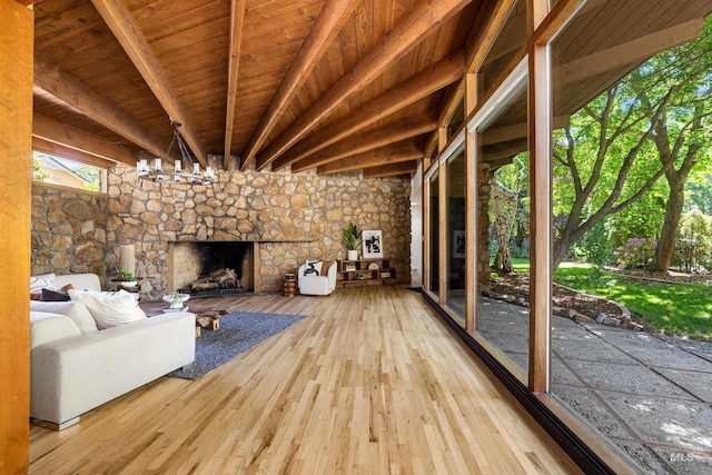2036 N Blaine Way, Boise, ID 83702 - unfurnished living room with hardwood / wood-style flooring, a fireplace, and wooden ceiling with exposed beams
