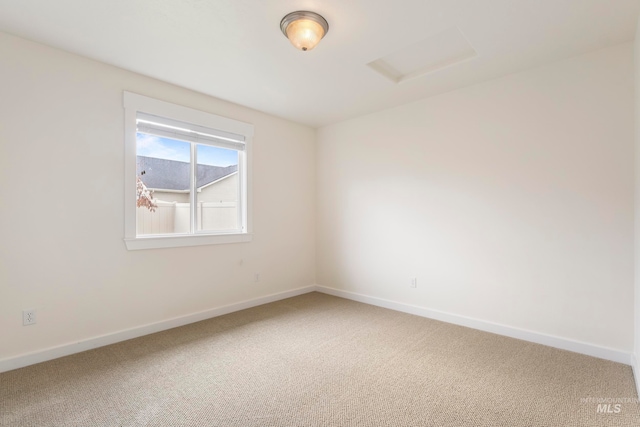 empty room featuring carpet flooring