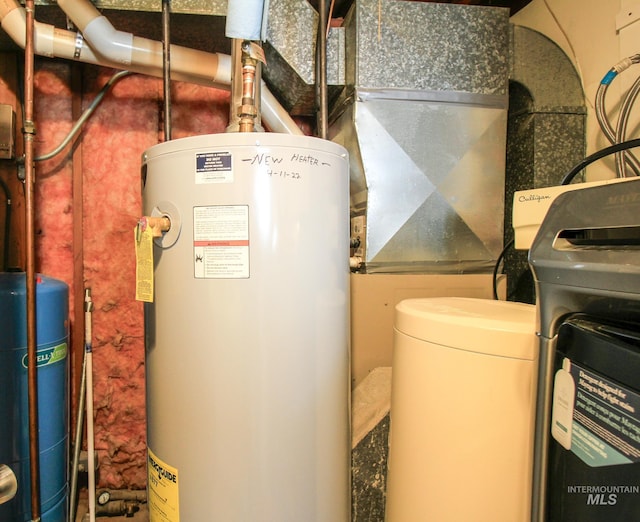 utility room with water heater