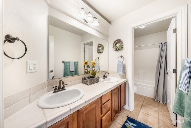 full bathroom with tile patterned flooring, vanity, toilet, and shower / bathtub combination with curtain