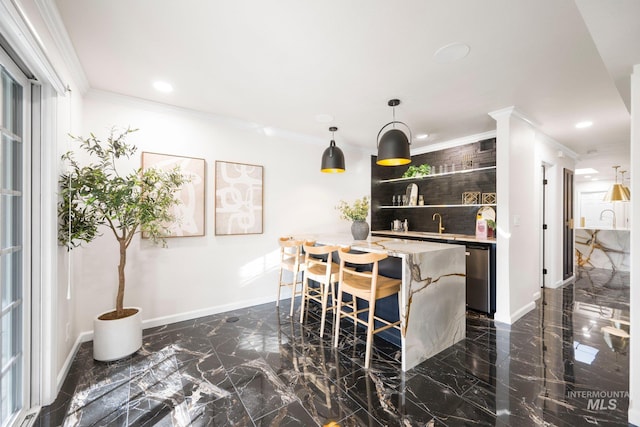 interior space with pendant lighting, crown molding, marble finish floor, and stainless steel dishwasher