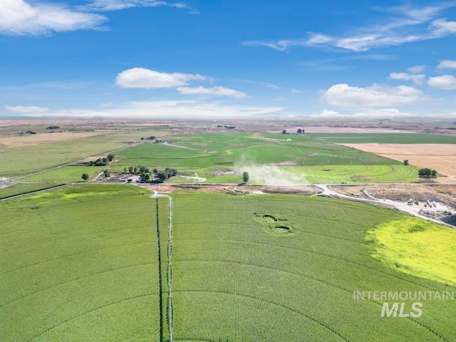 birds eye view of property with a rural view