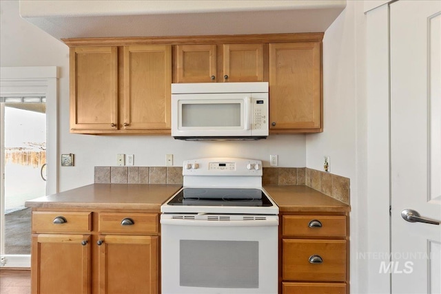 kitchen featuring white appliances