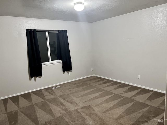 981 SW Independence, Mountain Home, ID 83647 - unfurnished room featuring baseboards, visible vents, and carpet