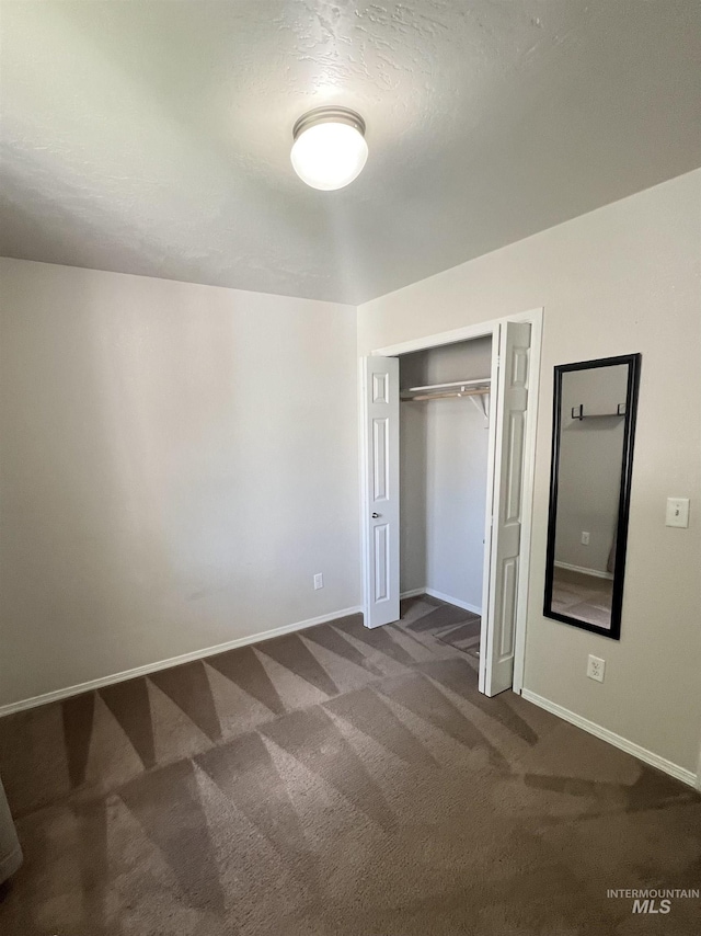 981 SW Independence, Mountain Home, ID 83647 - unfurnished bedroom featuring baseboards, carpet, and a closet
