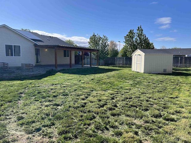 981 SW Independence, Mountain Home, ID 83647 - view of yard featuring a fenced backyard, an outbuilding, a patio, and a storage shed