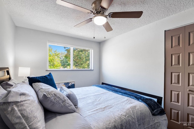946 S Curtis Rd, Boise, ID 83705 - bedroom with a textured ceiling and a ceiling fan