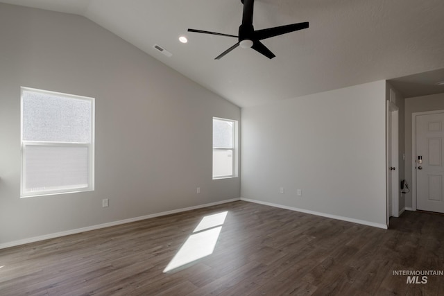 unfurnished room featuring dark wood-type flooring, ceiling fan, and high vaulted ceiling