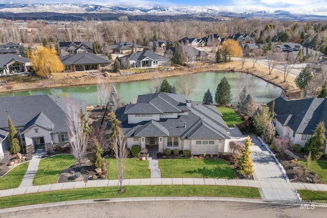 bird's eye view featuring a water and mountain view