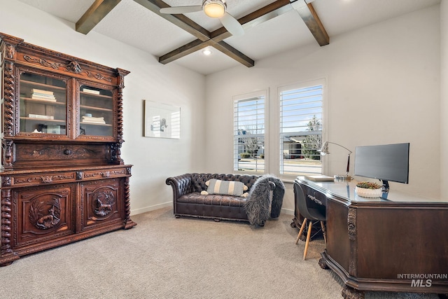 home office featuring beamed ceiling, light colored carpet, coffered ceiling, and ceiling fan