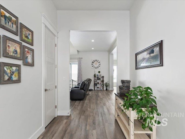 hallway with wood-type flooring