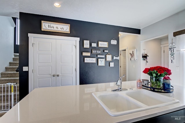 172 S Echo Canyon Ave, Meridian, ID 83642 - kitchen with a sink and light countertops